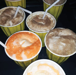cups filled with ice cream floats