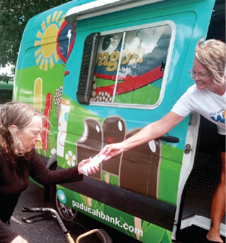 Riverhaven Nursing and Rehab resident getting ice cream from the WOW Van Ice Cream Truck