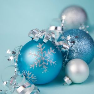 white and light blue ornaments on baby blue background